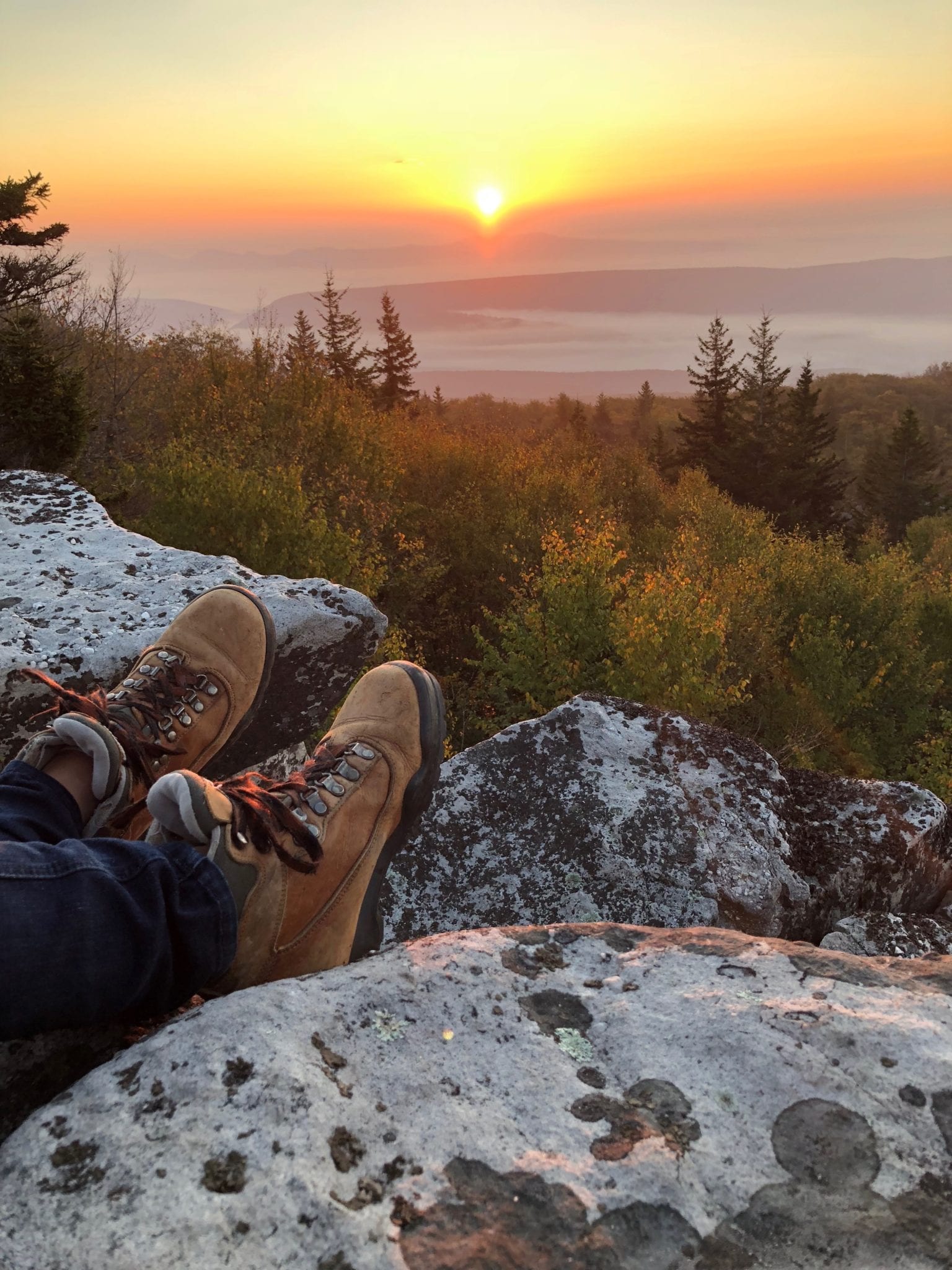 a hiker relaxing with a beautiful view of dolly sods