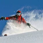 skier going down slope