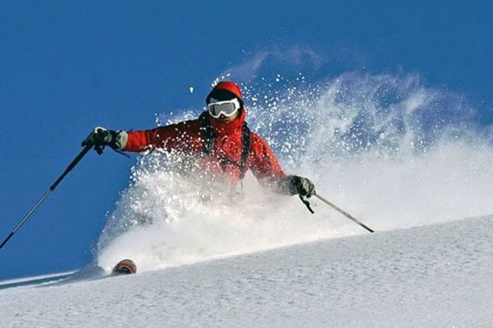 skier going down a slope