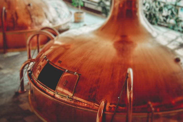 large copper alcohol distiller